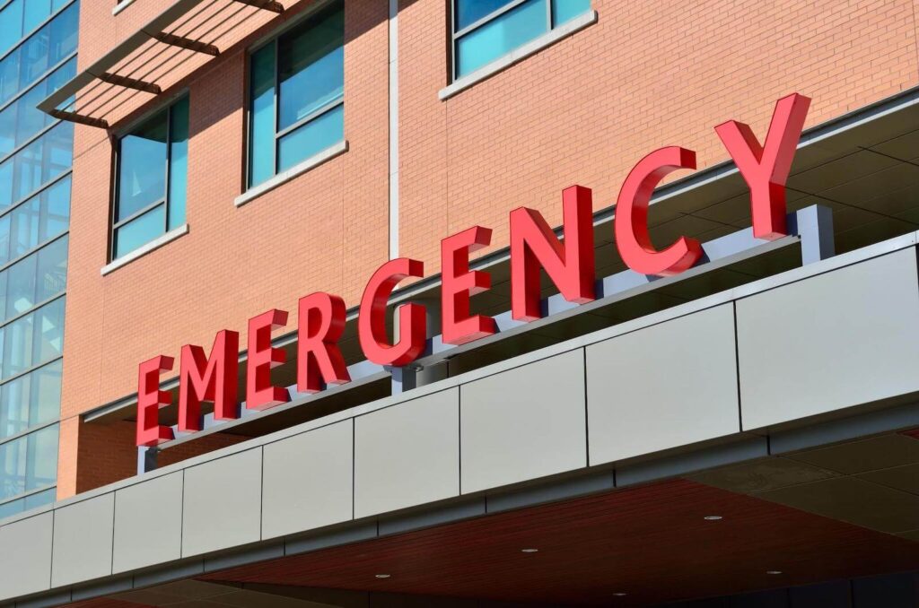 who needs private medical insurance - emergency room sign